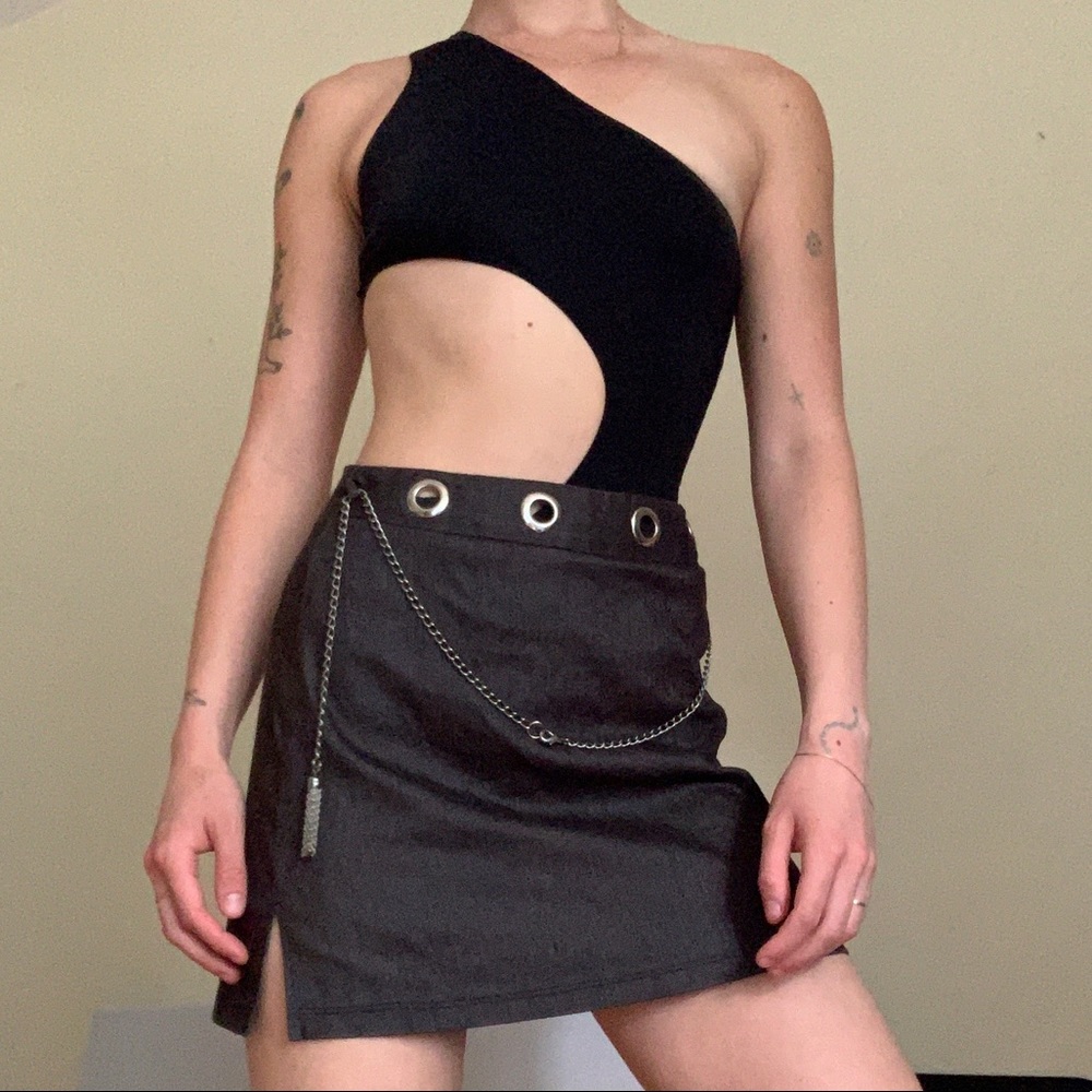 Grey skirt with circular metal detailing